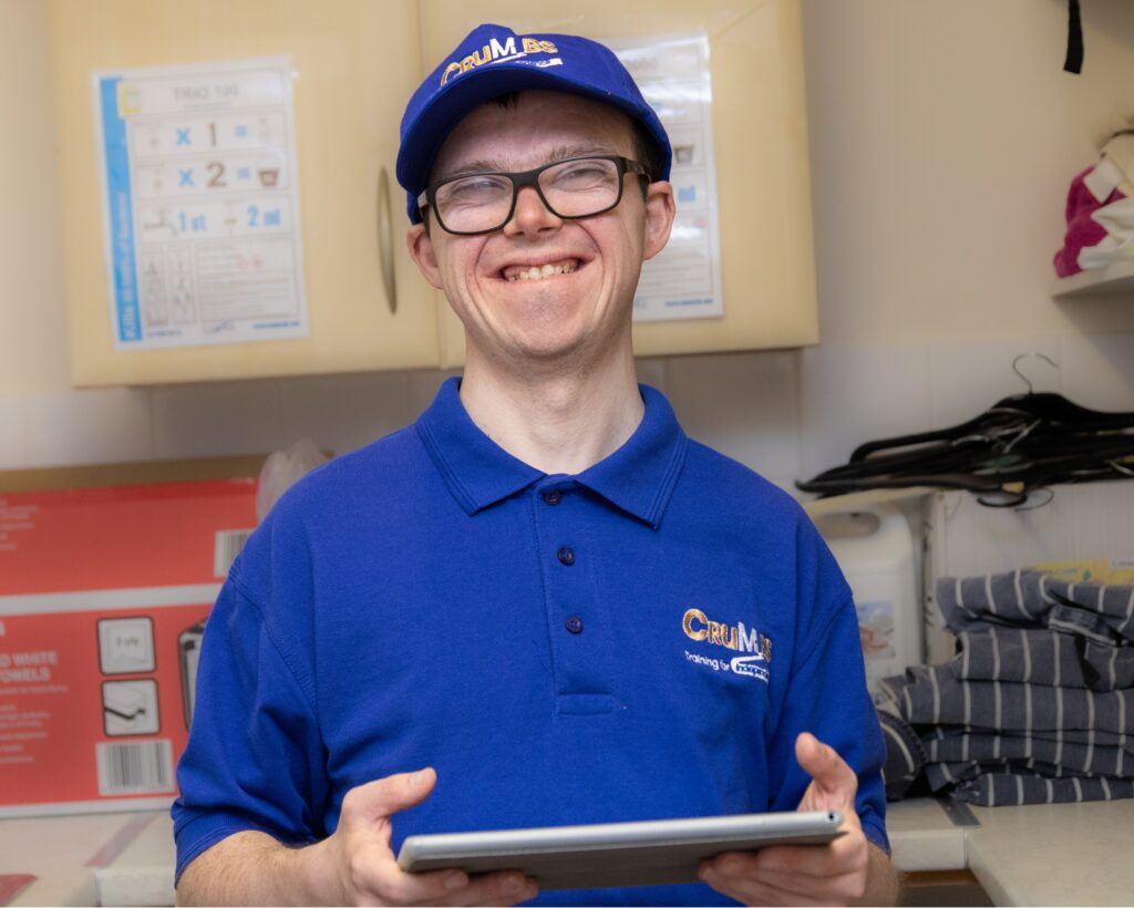 Trainee holding tablet computer